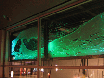 Public art panel with green lighting