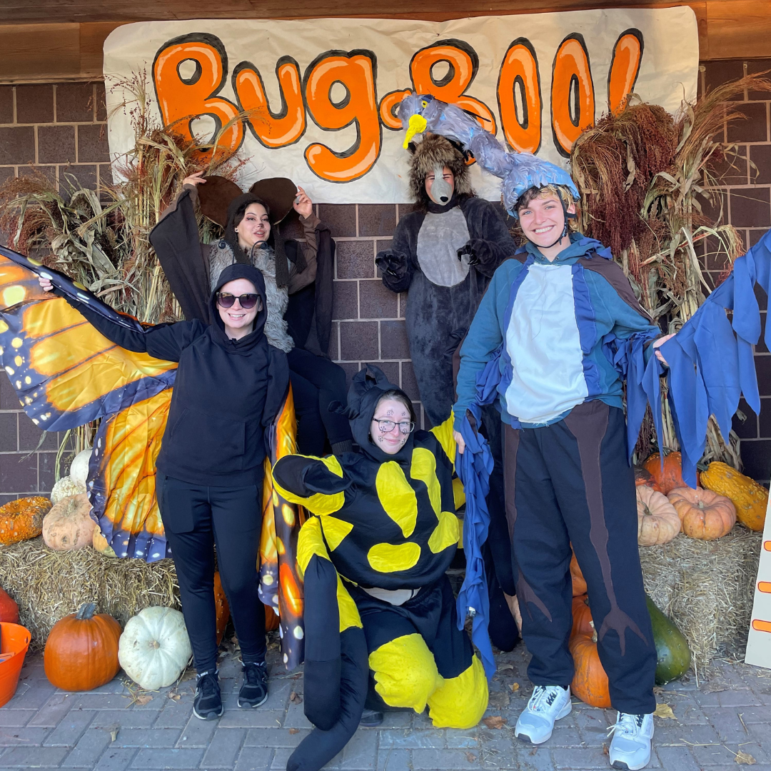 Ecology Center staffers dressed up in animal outfits for Bug-a-Boo