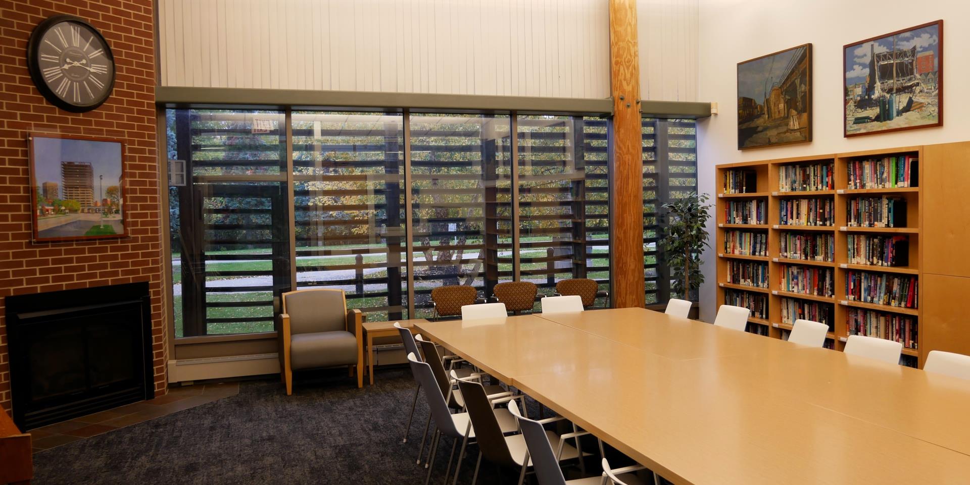 Levy Library with fireplace, table and chairs