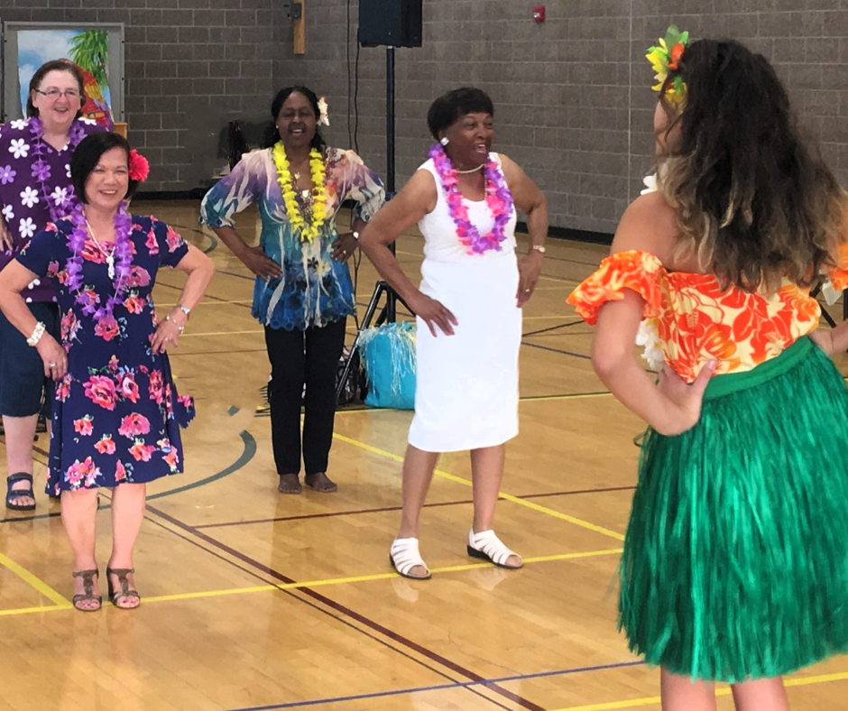 Seniors at a special Hawaiian dance event